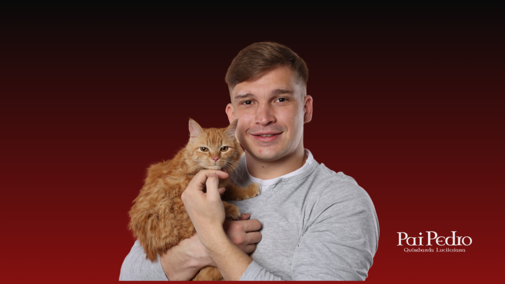 Homem sensivel segurando um gato em fundo vermelho escuro, representando um lado carinhoso, calmo e aparentemente afetuoso nos relacionamentos.